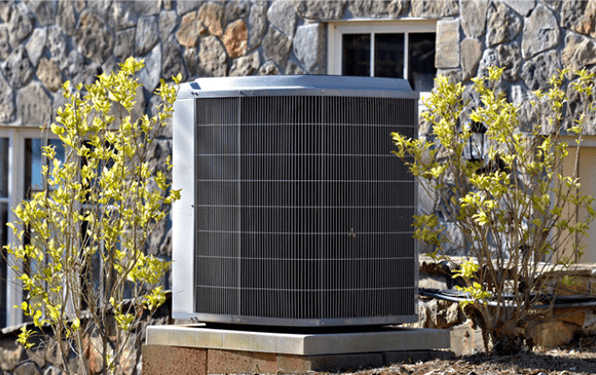 an air conditioner unit on the side of a house